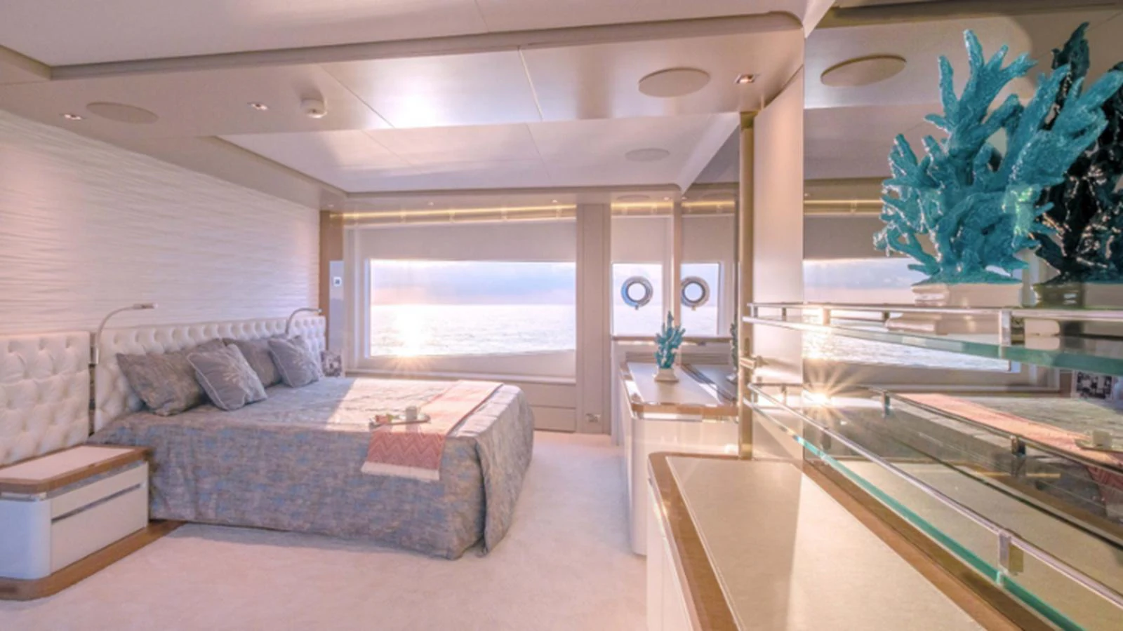 The master stateroom offers a luxurious and serene retreat with a stunning ocean view. aboard NEW Yacht for Sale