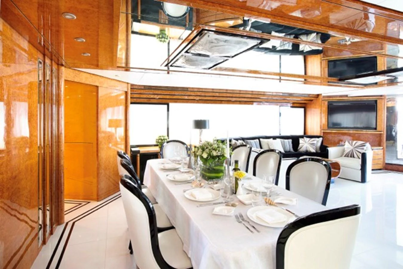 a dining room with a table aboard MILOS AT SEA Yacht for Sale