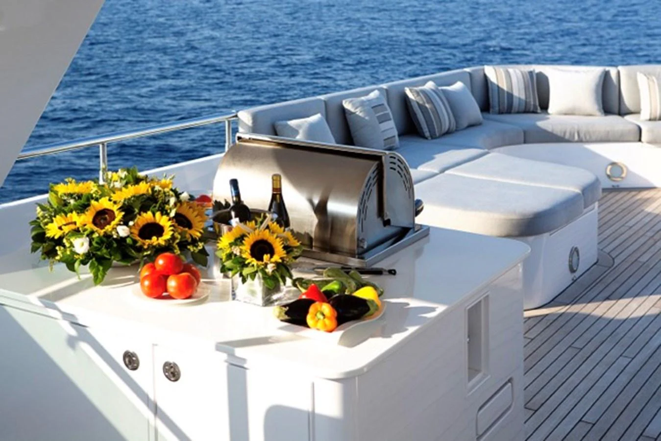 a boat with a flower arrangement on the front aboard MILOS AT SEA Yacht for Sale
