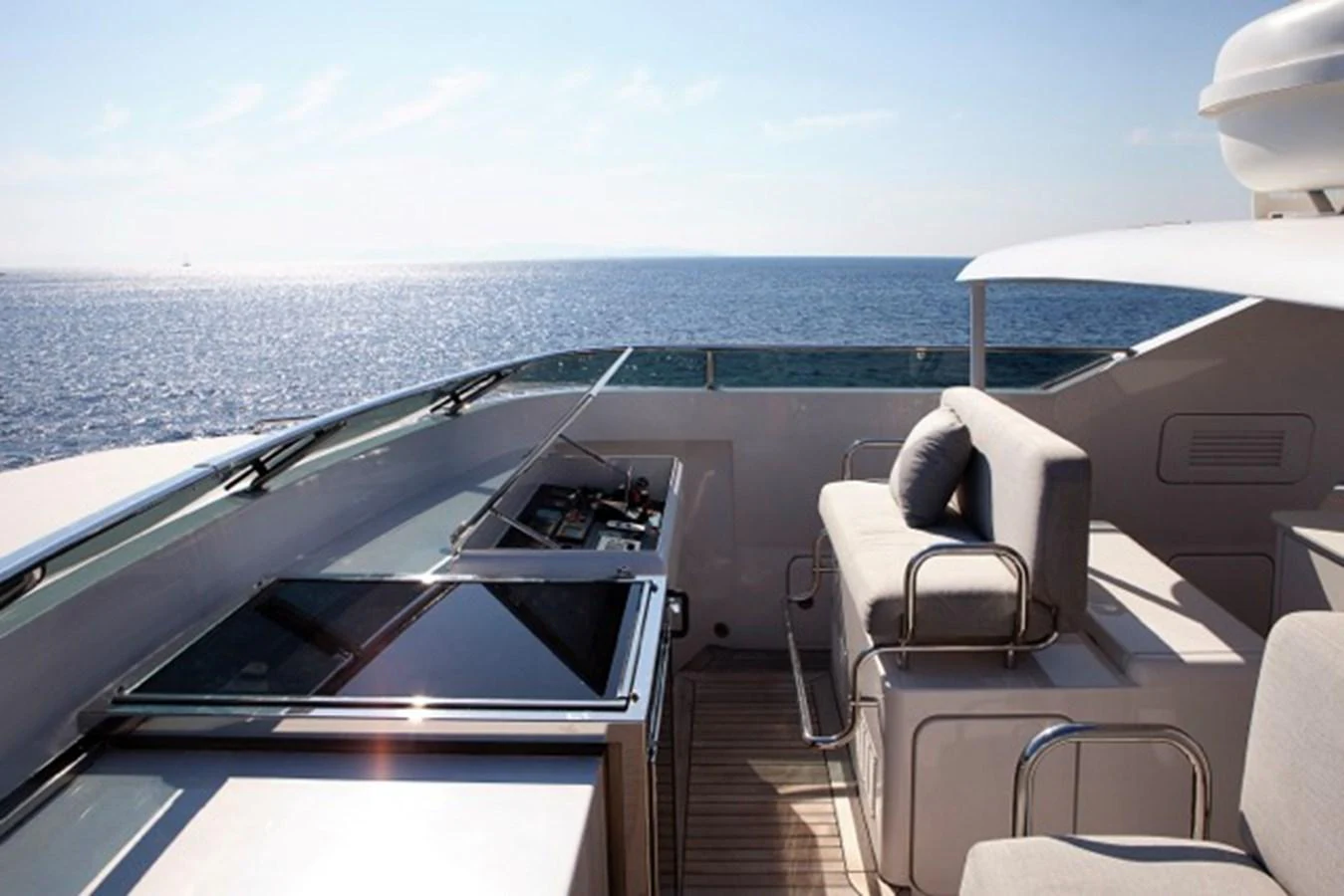 a boat with chairs on the deck aboard MILOS AT SEA Yacht for Sale