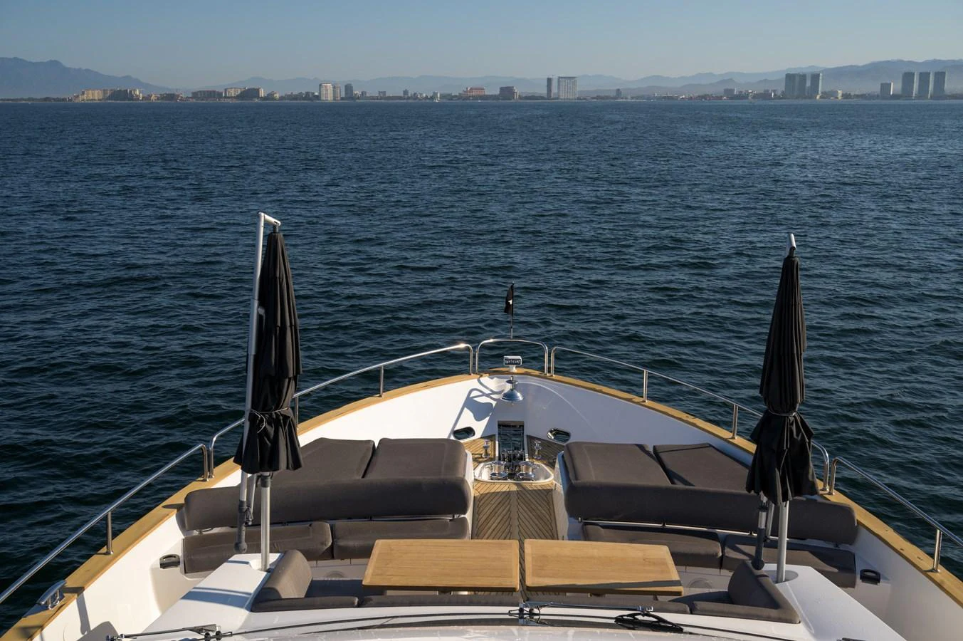 The yacht's foredeck offers a spacious and inviting area for relaxation with comfortable seating and stunning views of the water. aboard EBRA Yacht for Sale