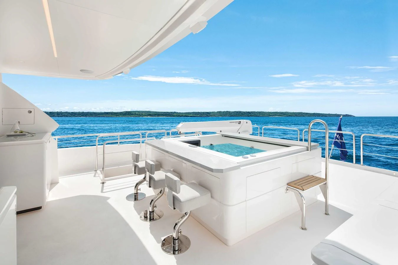 The sundeck features a luxurious hot tub with stunning ocean views. aboard HORIZON FD80-617 / COMING FALL 2025 Yacht for Sale