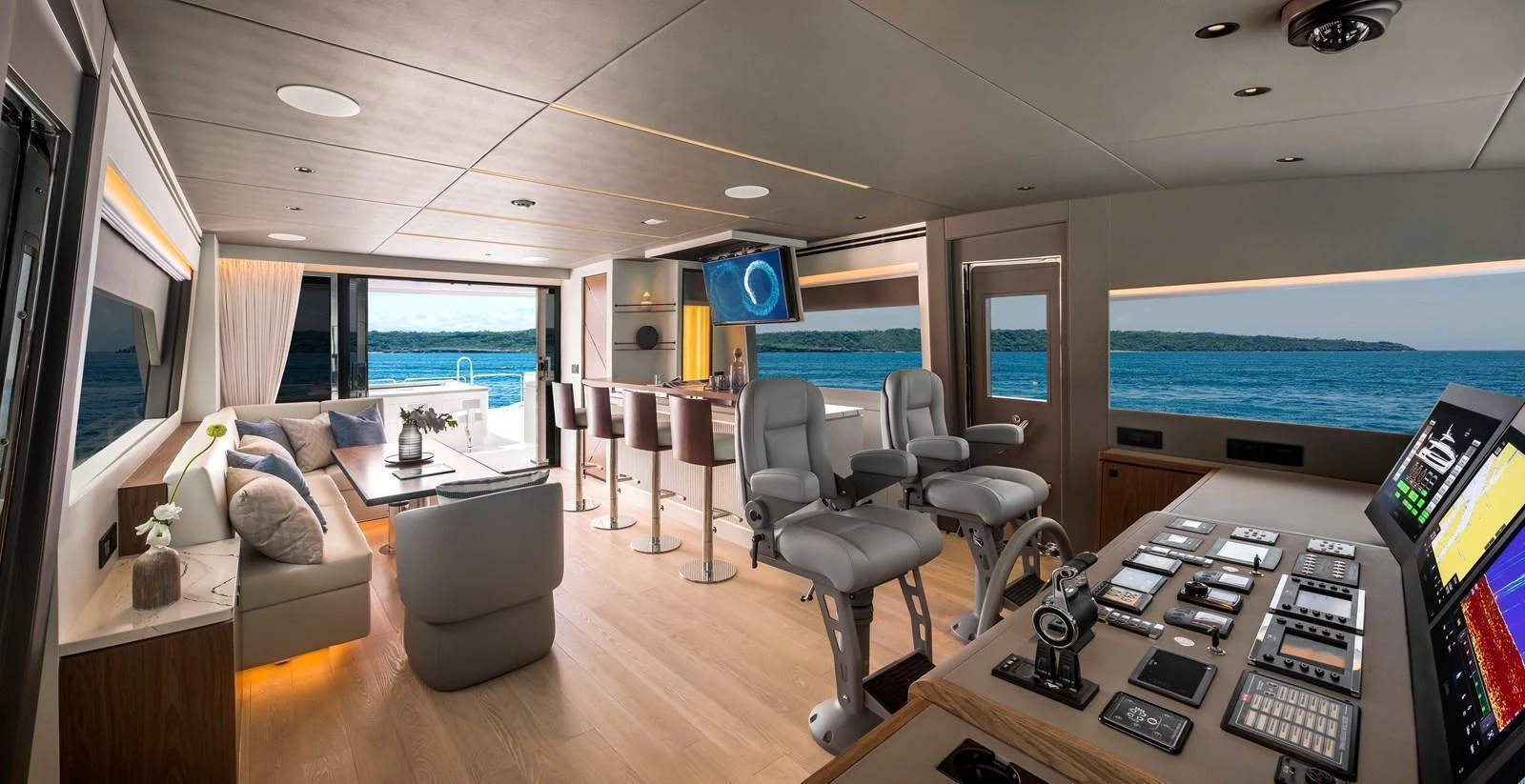 The salon offers a spacious and modern living area with panoramic views and luxurious seating. aboard HORIZON FD80-617 / COMING FALL 2025 Yacht for Sale