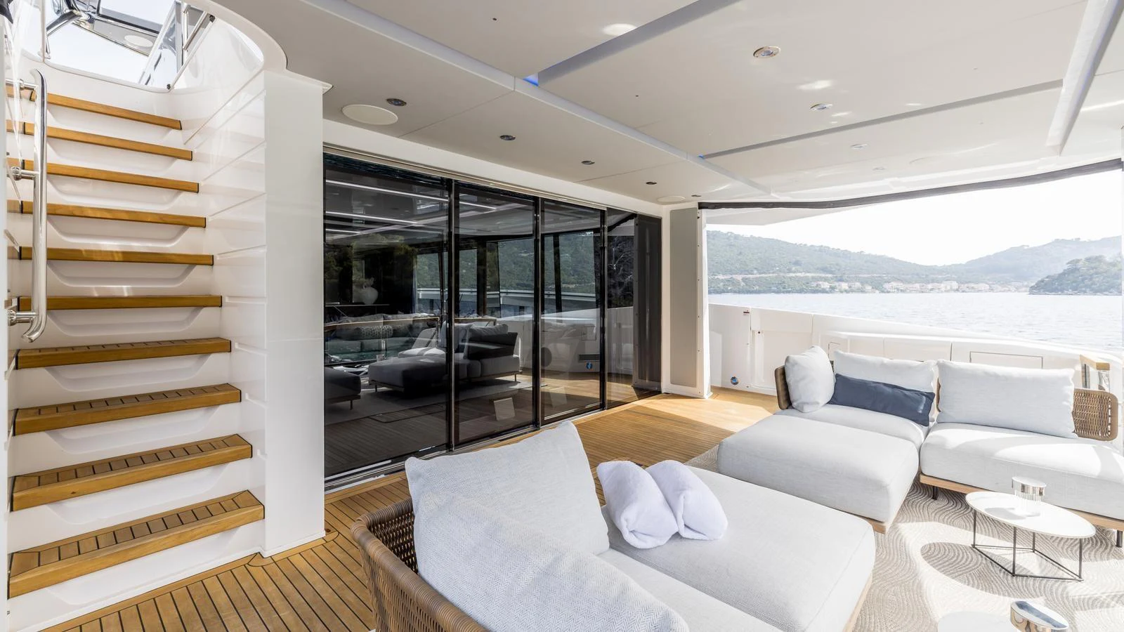 a living room with a large open door aboard EXIT Yacht for Sale