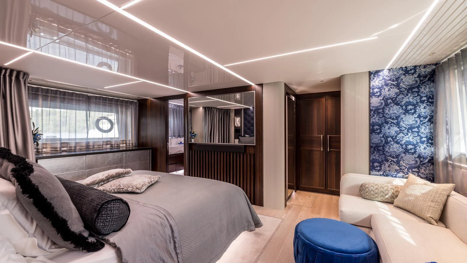 a bedroom with a large bed aboard EXIT Yacht for Sale
