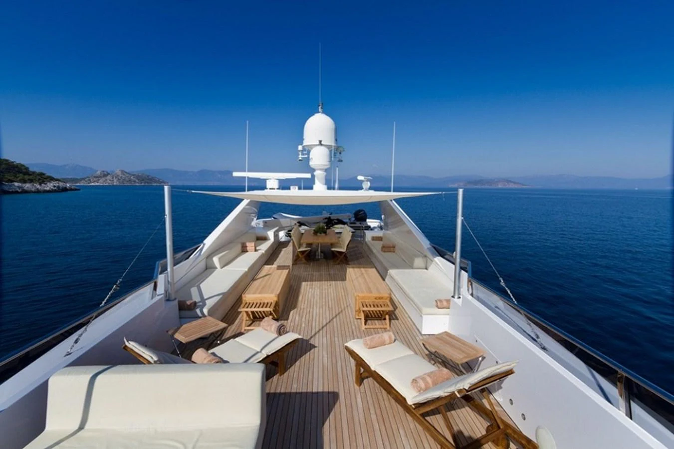 The yacht's sundeck offers a spacious and luxurious area for relaxation with stunning sea views. aboard MABROUK Yacht for Sale