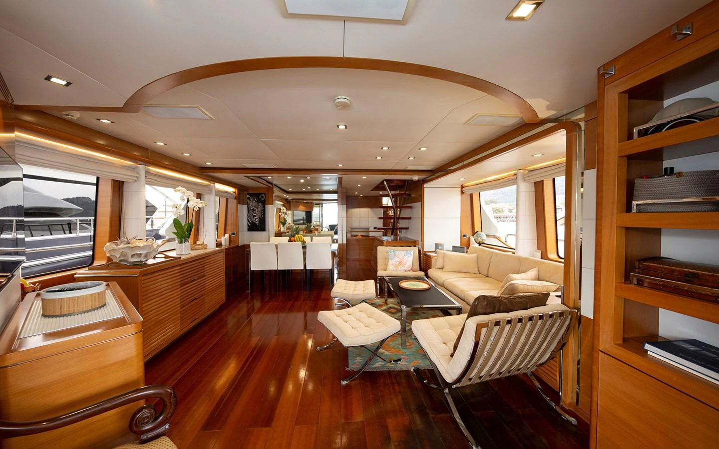 The salon features elegant furnishings and ample natural light, creating a luxurious and inviting atmosphere. aboard SOFIA OF TORTOLA Yacht for Sale