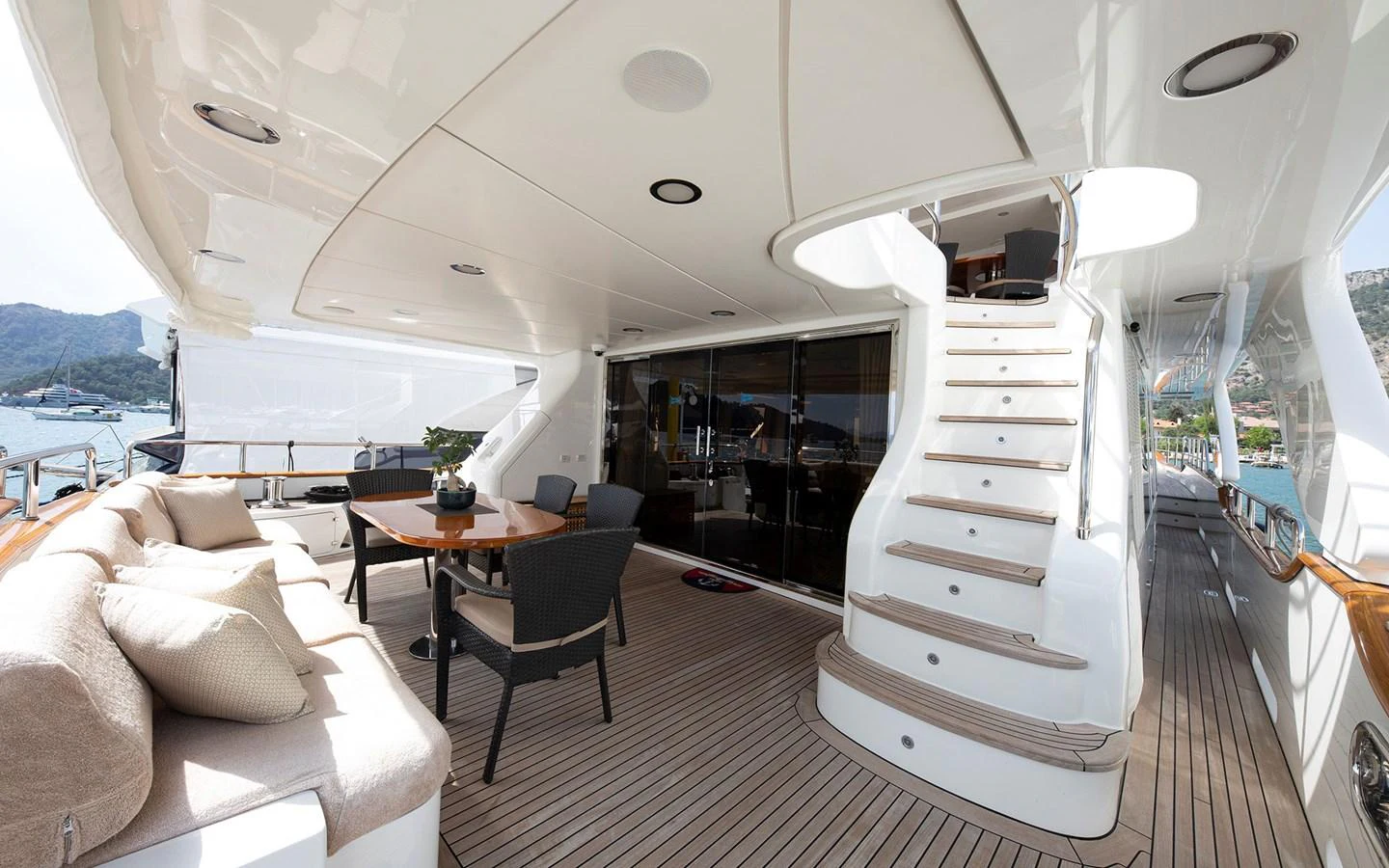 The aft deck offers a spacious and inviting area for relaxation and dining with a beautiful view of the surroundings. aboard SOFIA OF TORTOLA Yacht for Sale