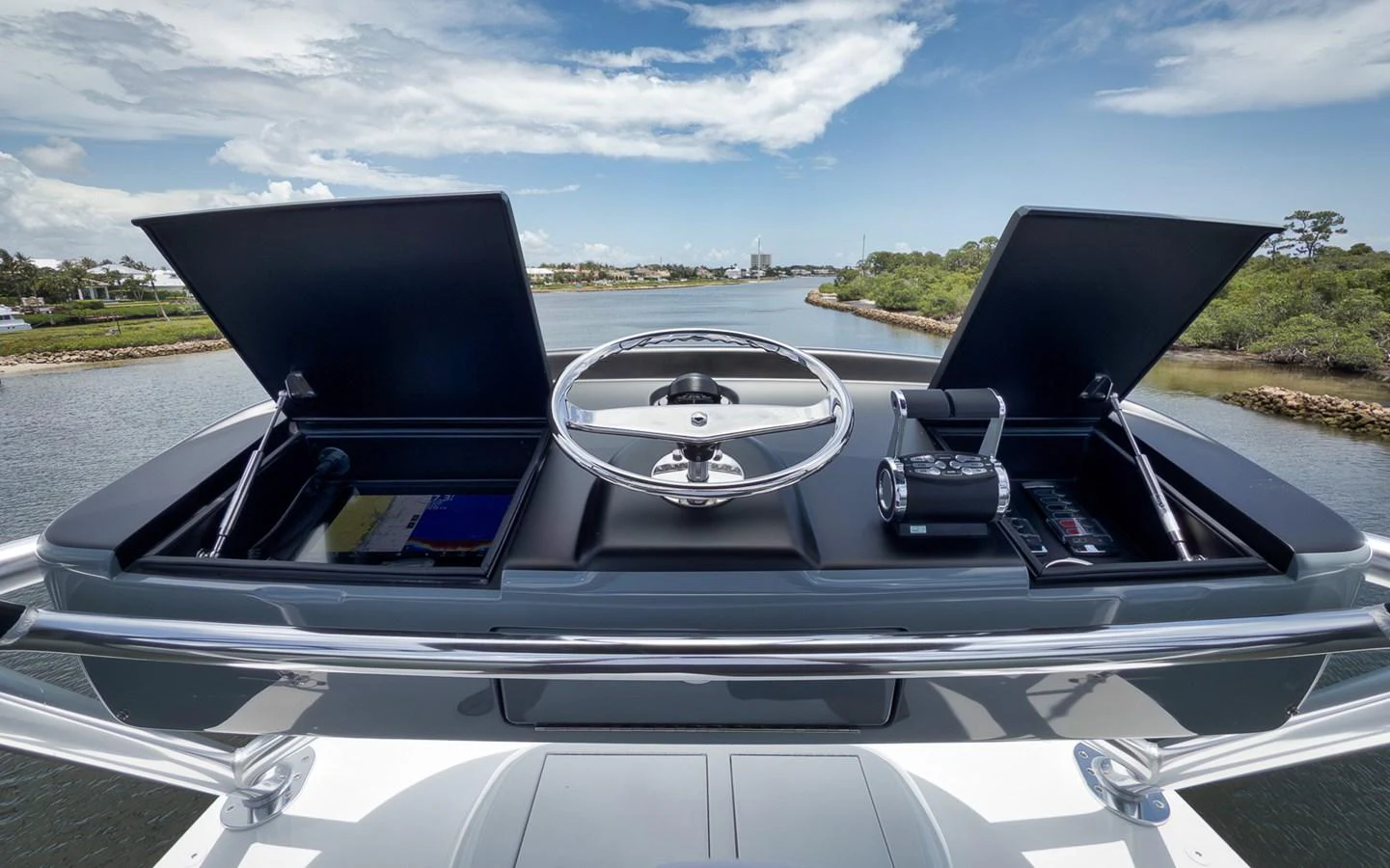 The helm station offers a sleek and modern control area with panoramic views. aboard LADY SURFBUM Yacht for Sale