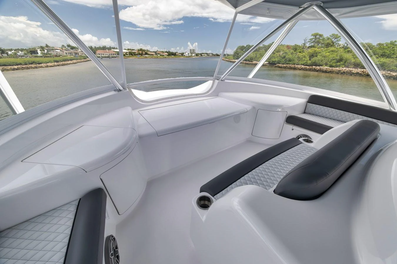 The helm area offers a sleek, modern design with comfortable seating and expansive views. aboard LADY SURFBUM Yacht for Sale
