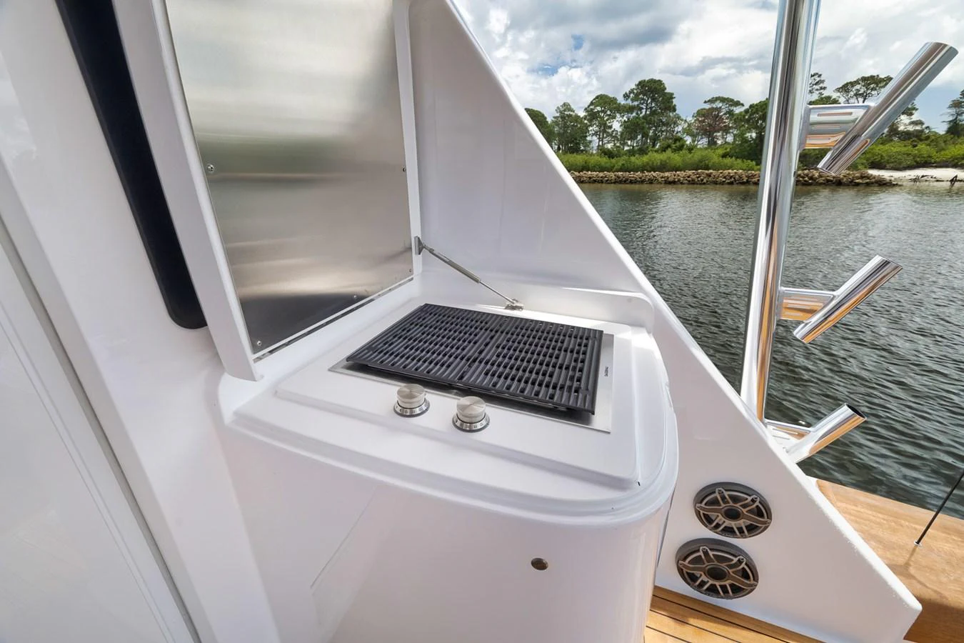 This image showcases a sleek built-in grill on the yacht's deck, perfect for outdoor cooking. aboard LADY SURFBUM Yacht for Sale