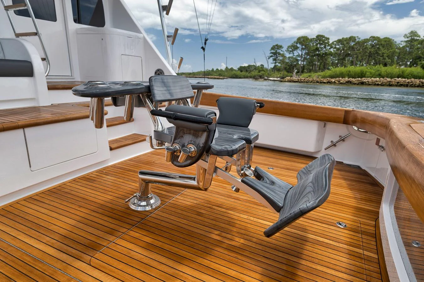 The yacht features a well-equipped fishing deck with a professional fighting chair, perfect for deep-sea fishing enthusiasts. aboard LADY SURFBUM Yacht for Sale