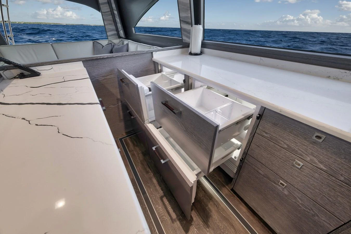 The yacht's galley features sleek cabinetry and modern countertops with ample storage space. aboard LADY SURFBUM Yacht for Sale