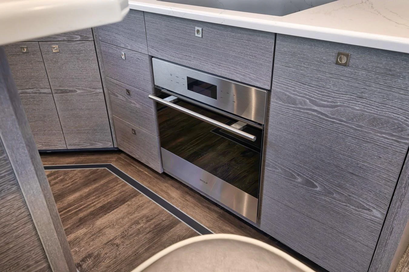 The yacht's galley features modern appliances and sleek cabinetry. aboard LADY SURFBUM Yacht for Sale