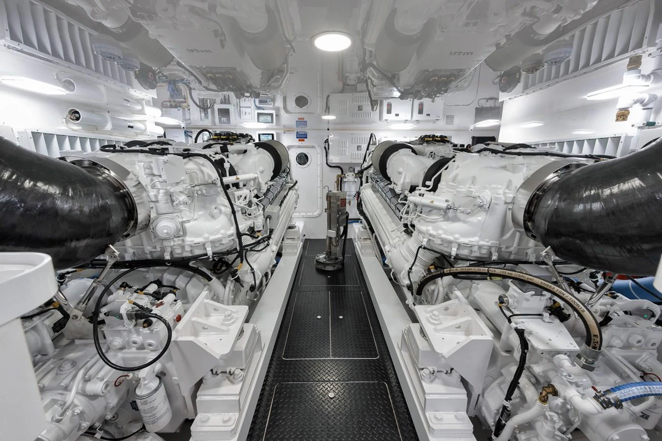 The engine room showcases powerful, meticulously maintained machinery. aboard LADY SURFBUM Yacht for Sale