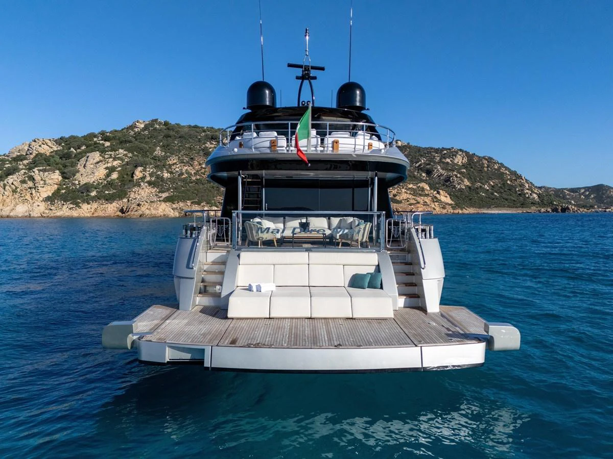 The yacht's aft deck offers a spacious and inviting area for relaxation with stunning views of the surrounding waters. aboard FILIPPETTI F100-03 Yacht for Sale