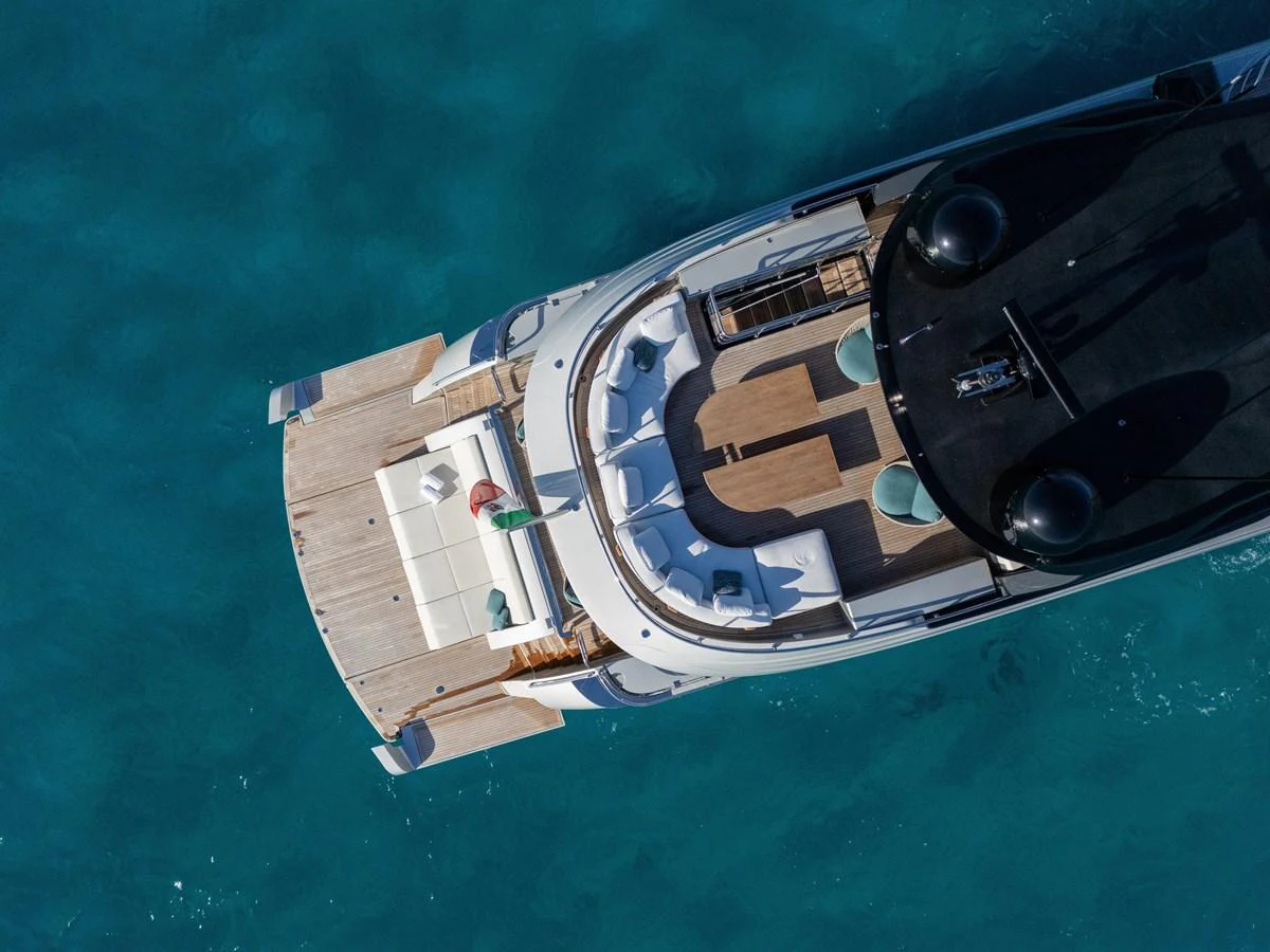 A stunning aerial view of the yacht's aft deck showcasing luxurious seating and a spacious layout. aboard FILIPPETTI F100-03 Yacht for Sale