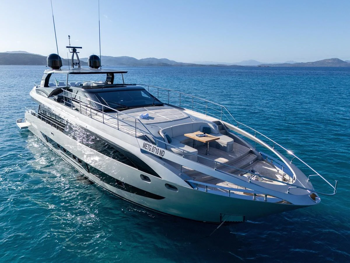 A sleek and modern yacht glides gracefully on calm blue waters, showcasing its luxurious design. aboard FILIPPETTI F100-03 Yacht for Sale