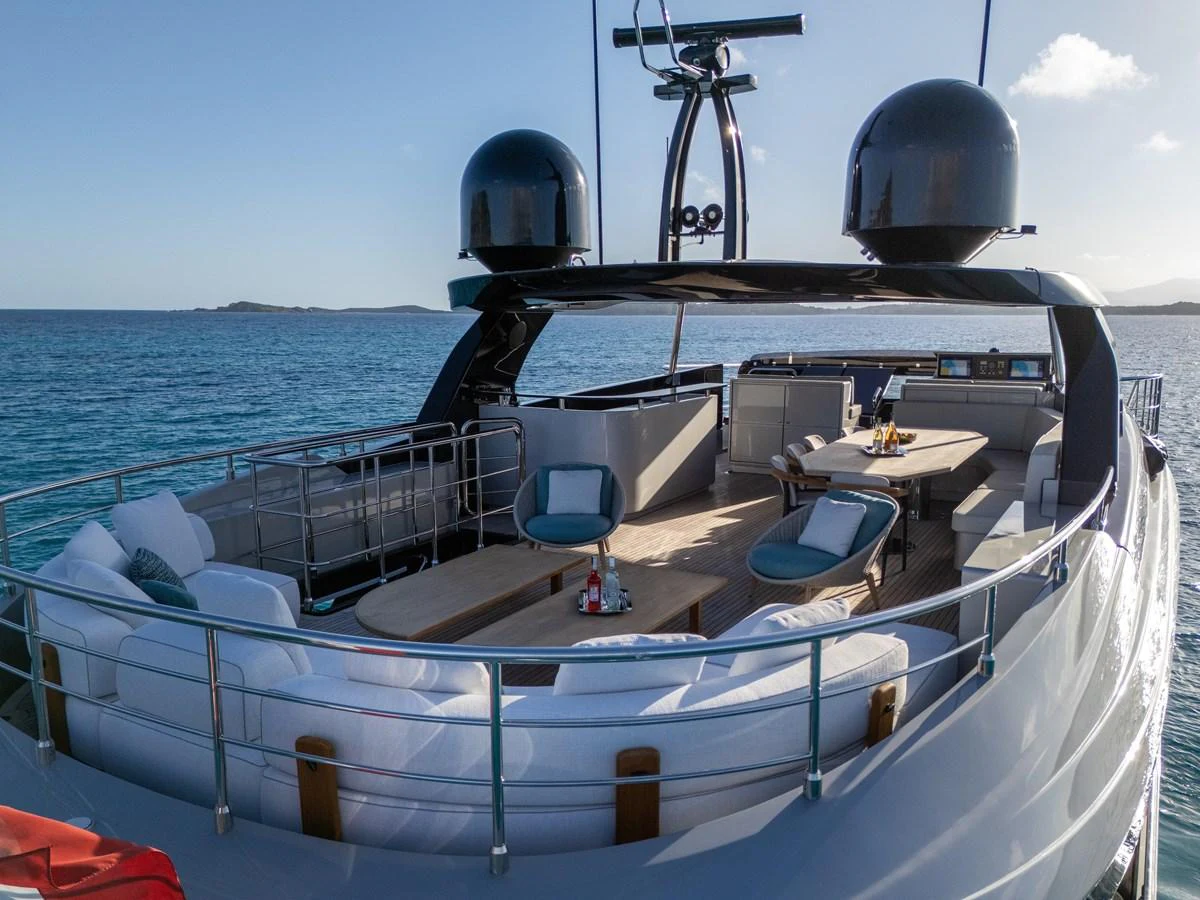 The yacht's aft deck offers a luxurious outdoor seating area with panoramic ocean views. aboard FILIPPETTI F100-03 Yacht for Sale