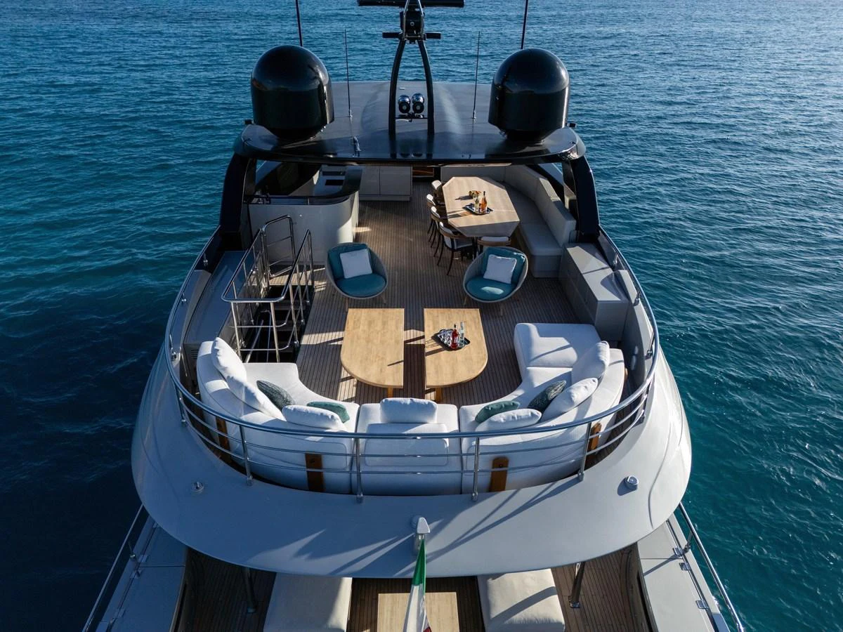 The flybridge offers an inviting space with ample seating and stunning ocean views. aboard FILIPPETTI F100-03 Yacht for Sale