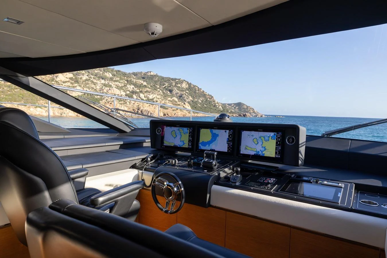 The helm station offers advanced navigation systems with a stunning view of the surrounding seascape. aboard FILIPPETTI F100-03 Yacht for Sale