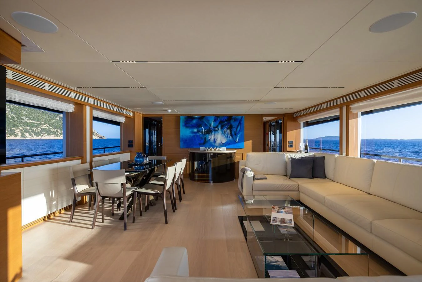 The spacious salon offers a luxurious and comfortable setting with panoramic views of the sea. aboard FILIPPETTI F100-03 Yacht for Sale
