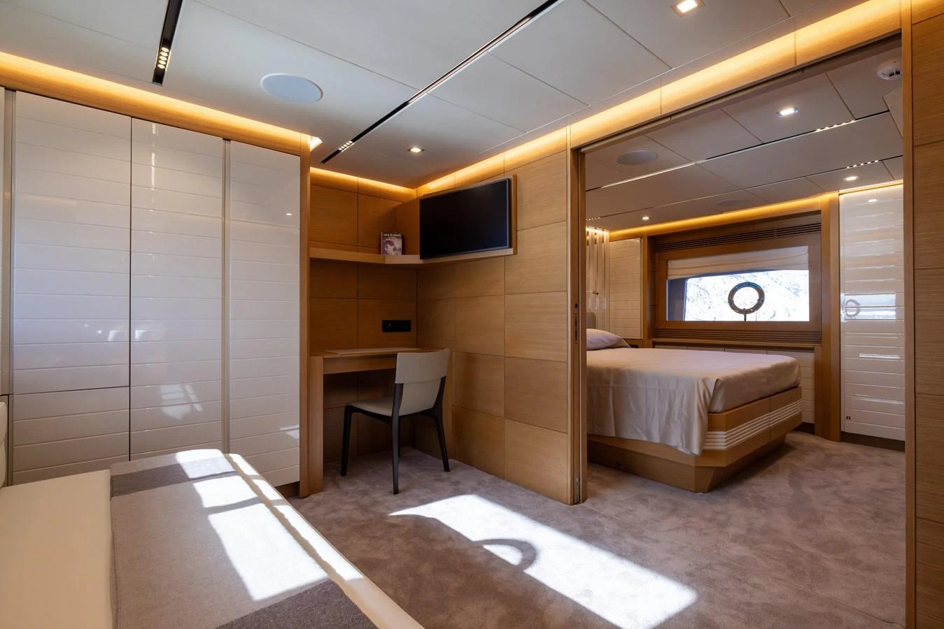 The master stateroom features a spacious layout with modern furnishings and ample natural light. aboard FILIPPETTI F100-03 Yacht for Sale