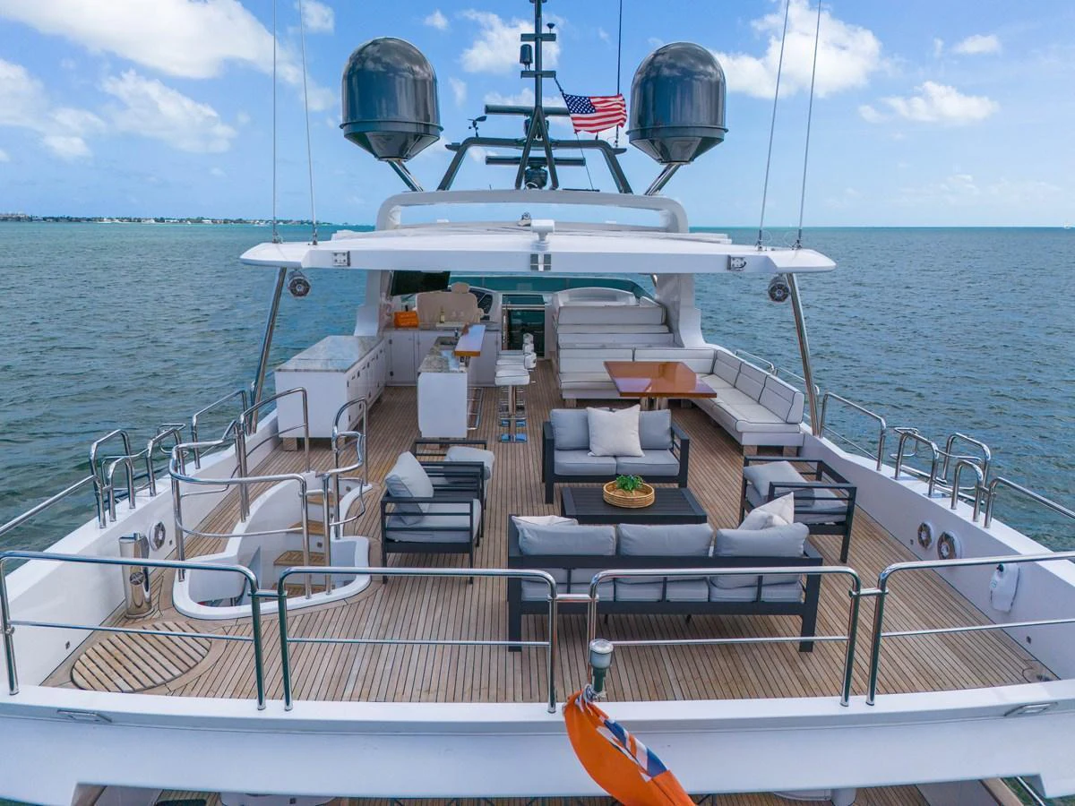 The yacht's sundeck offers a spacious and luxurious area for relaxation and entertainment with stunning ocean views. aboard AZIMUT GRANDE 105 Yacht for Sale