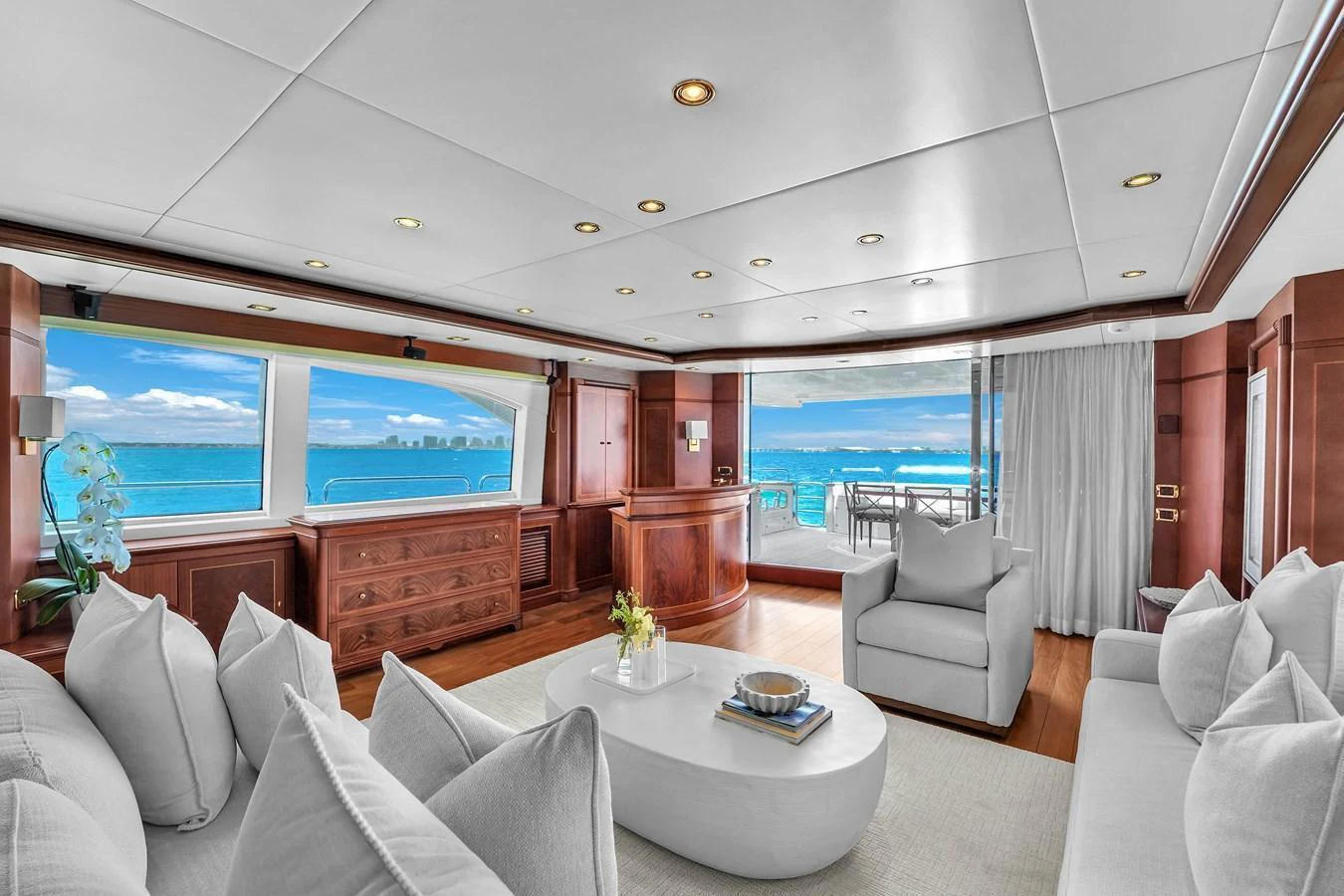 The salon boasts a spacious and elegant design with panoramic ocean views. aboard AZIMUT GRANDE 105 Yacht for Sale