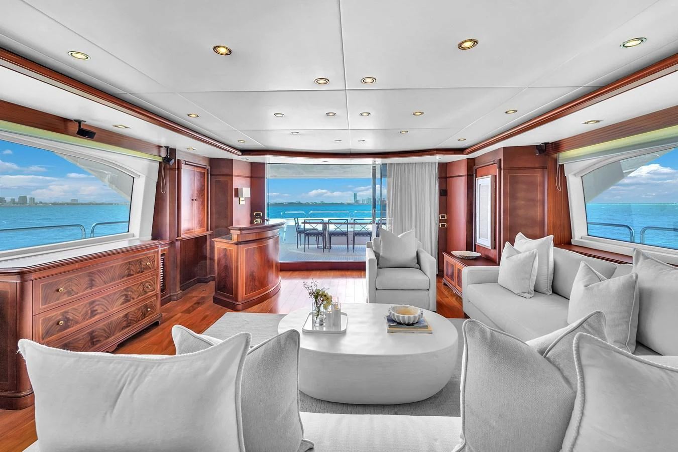 The salon offers a spacious and elegant area with panoramic ocean views and luxurious seating. aboard AZIMUT GRANDE 105 Yacht for Sale