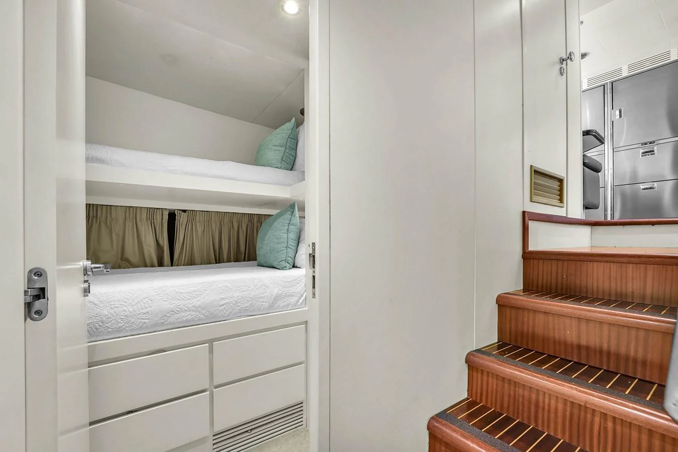 The crew quarters feature comfortable bunk beds and practical storage solutions. aboard AZIMUT GRANDE 105 Yacht for Sale
