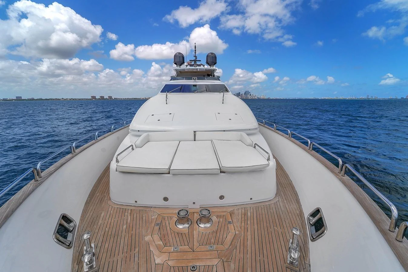 The yacht's foredeck features spacious sun pads and a sleek design, perfect for relaxation while cruising. aboard AZIMUT GRANDE 105 Yacht for Sale