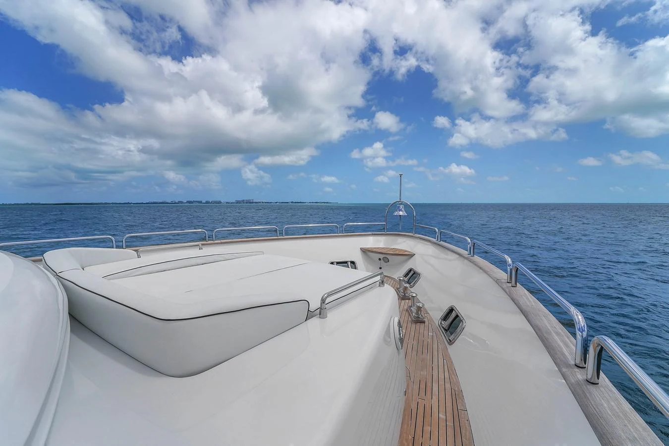 The foredeck offers a spacious sunbathing area with stunning ocean views. aboard AZIMUT GRANDE 105 Yacht for Sale