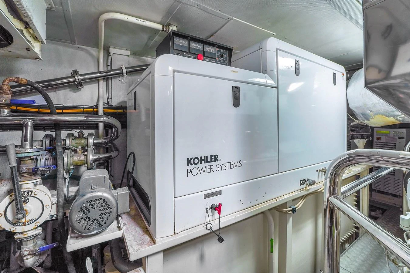 The image showcases the yacht's engine room featuring a Kohler power system. aboard AZIMUT GRANDE 105 Yacht for Sale