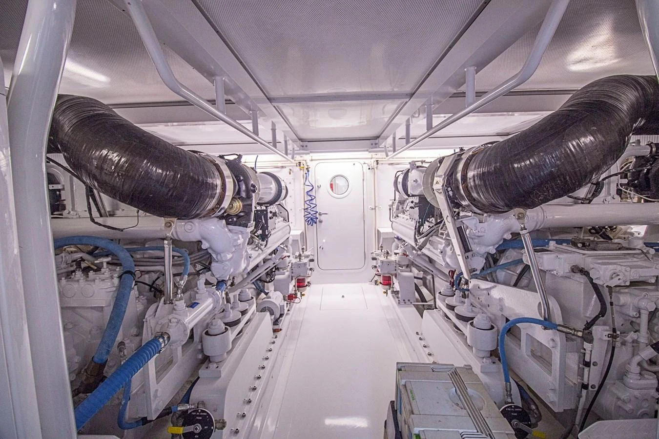 The image showcases the clean and well-organized engine room of the yacht, highlighting its advanced machinery. aboard REMAIN CALM Yacht for Sale