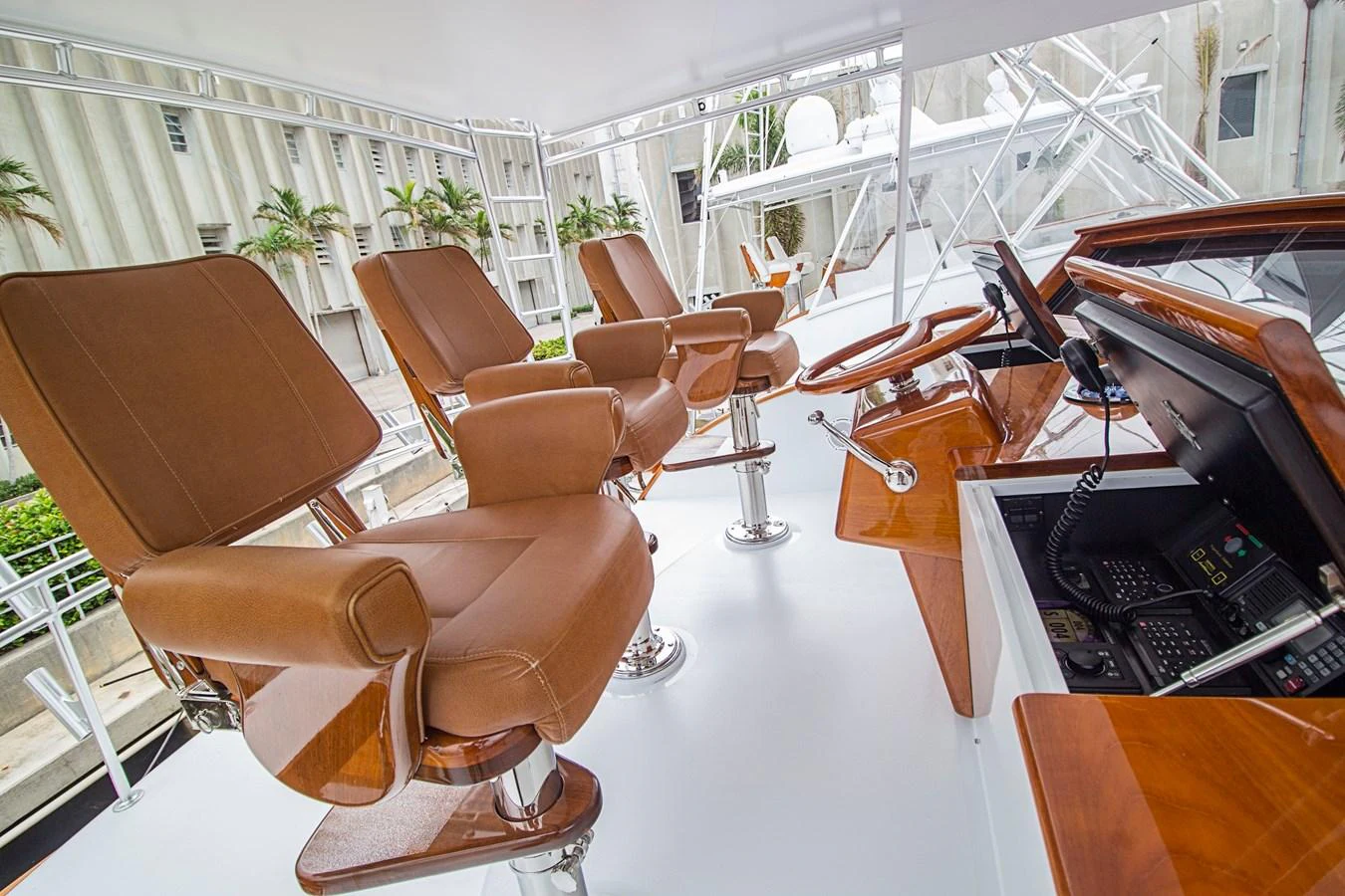 The helm area features luxurious leather captain's chairs and state-of-the-art navigation equipment. aboard REMAIN CALM Yacht for Sale