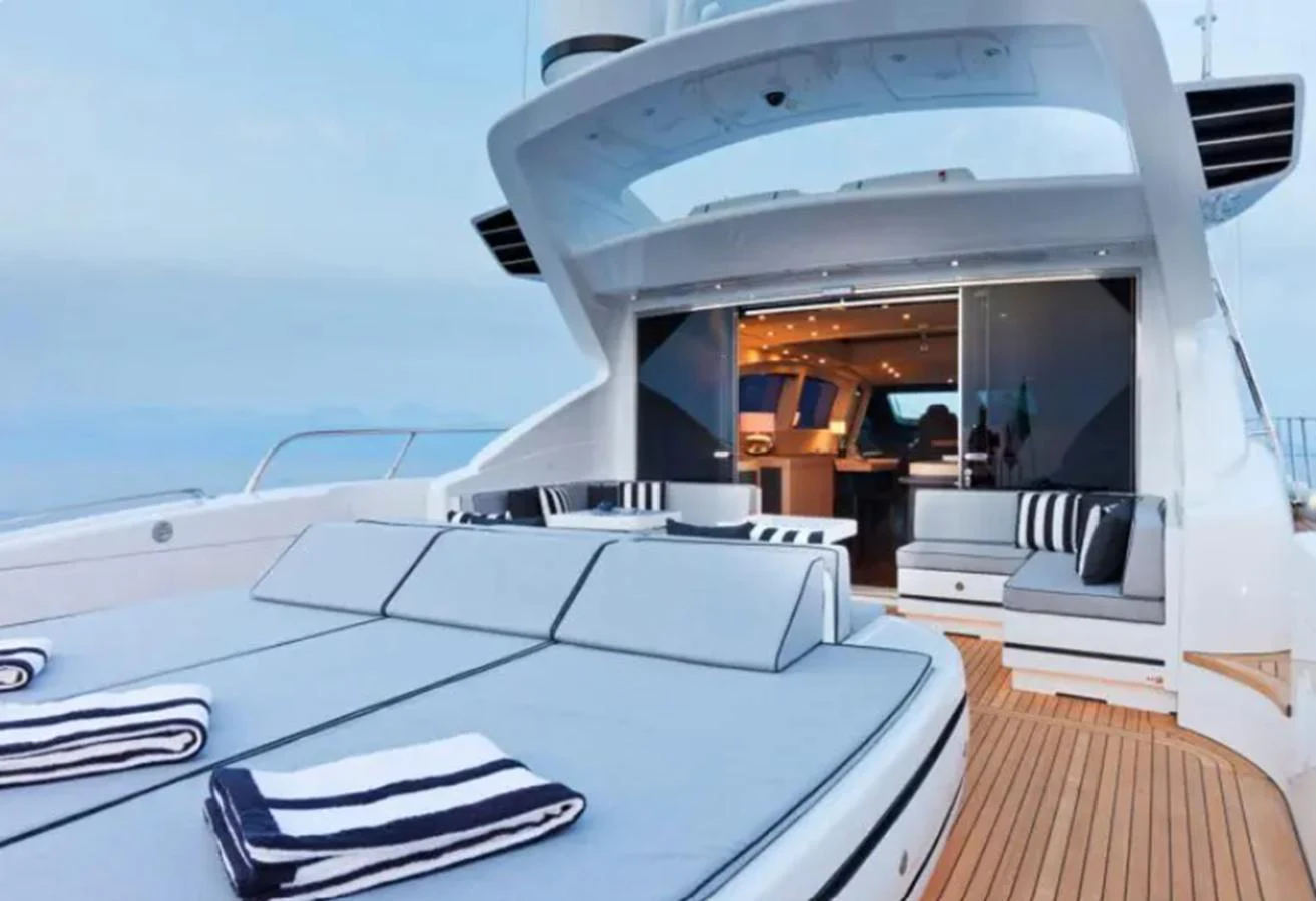 a boat with a desk and chairs aboard MANU Yacht for Sale