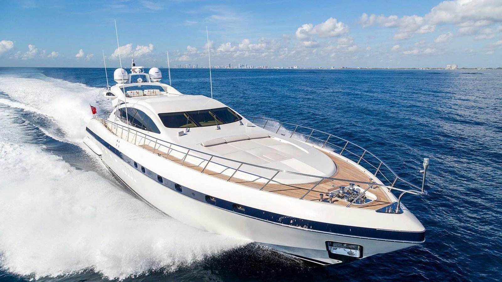 a white yacht on the water aboard MANU Yacht for Sale