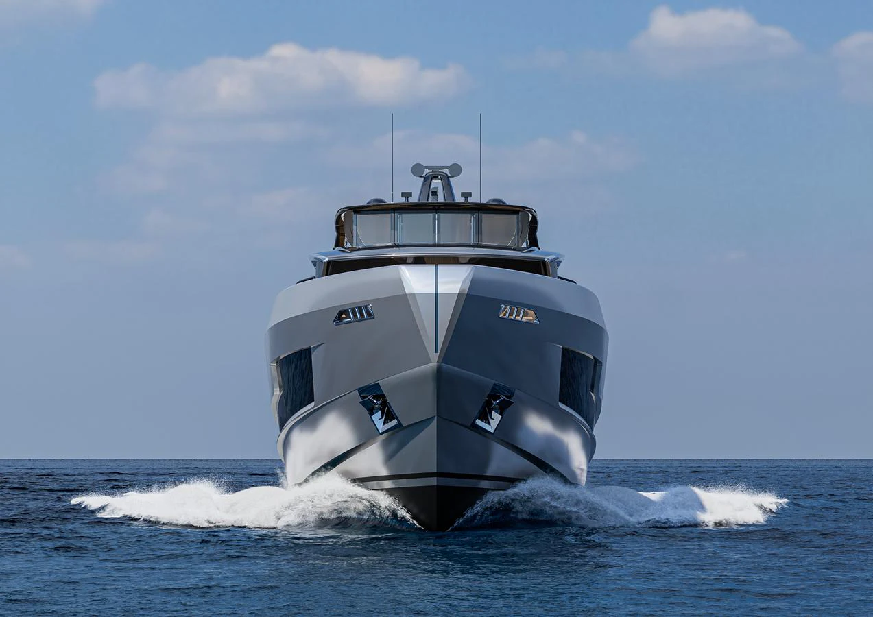 A sleek and modern yacht cuts through the water, showcasing its impressive bow design. aboard ISA VIPER 130 Yacht for Sale