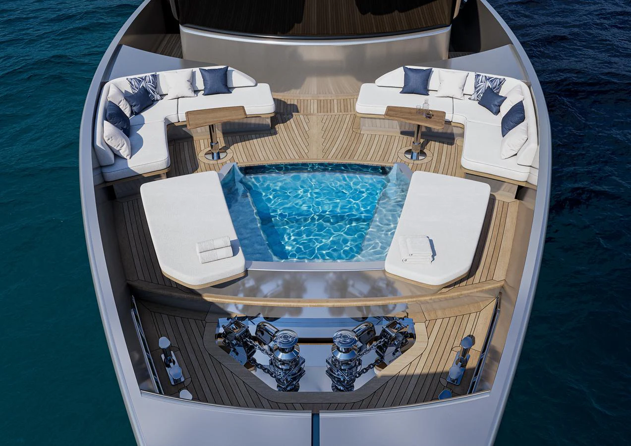 The foredeck features a luxurious seating area and a pristine pool, perfect for relaxation. aboard ISA VIPER 130 Yacht for Sale
