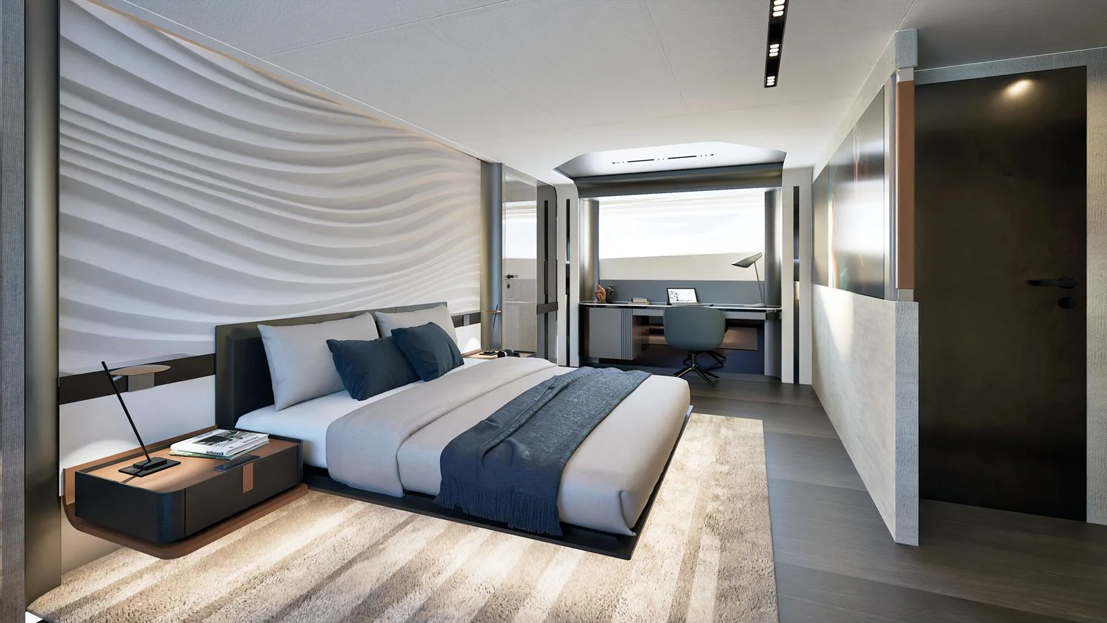 The master stateroom features a luxurious bed, modern decor, and a spacious layout with a work desk. aboard ISA VIPER 130 Yacht for Sale