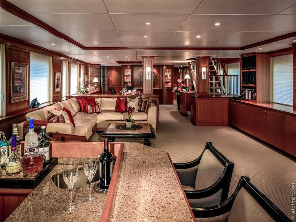 a living room with a table and chairs aboard MURPHY'S LAW Yacht for Sale