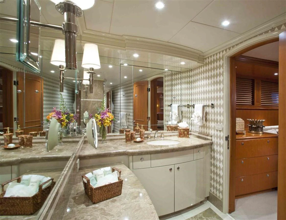 a bathroom with a large marble countertop aboard MURPHY'S LAW Yacht for Sale