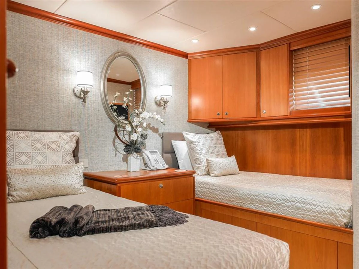 a couple of beds in a room aboard MURPHY'S LAW Yacht for Sale