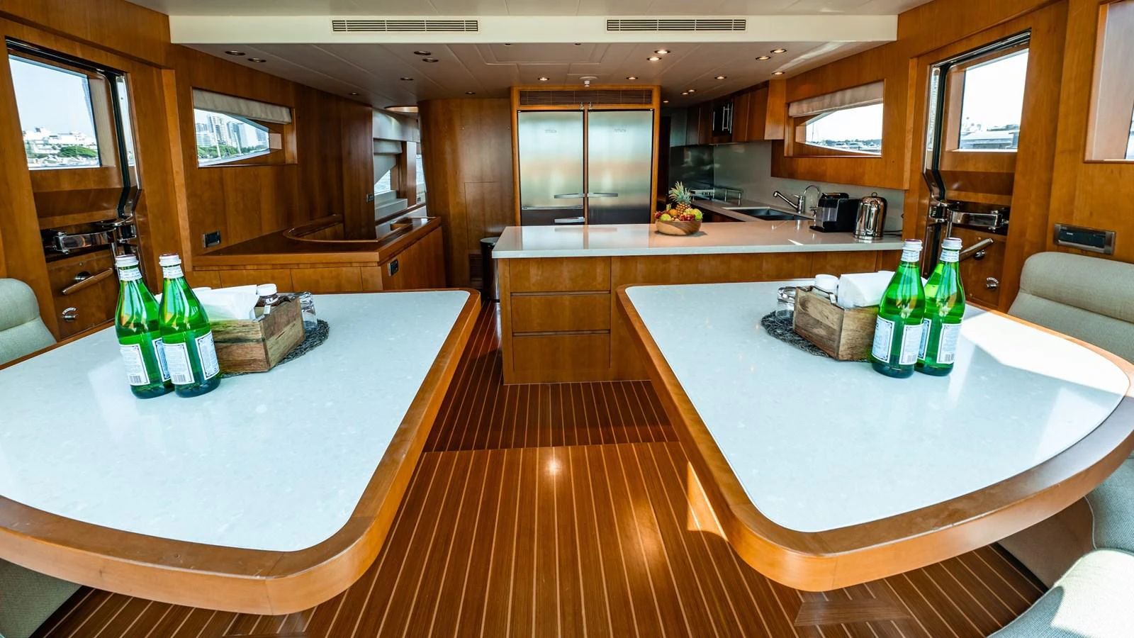The yacht's galley features modern amenities and a spacious layout with elegant wooden finishes. aboard THE CLUBHOUSE Yacht for Sale