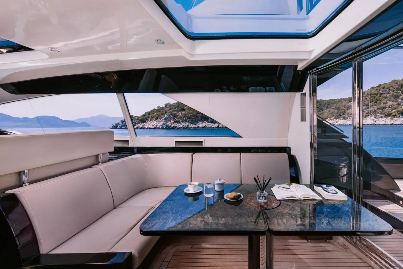 a table on a boat aboard WHO CARES Yacht for Sale