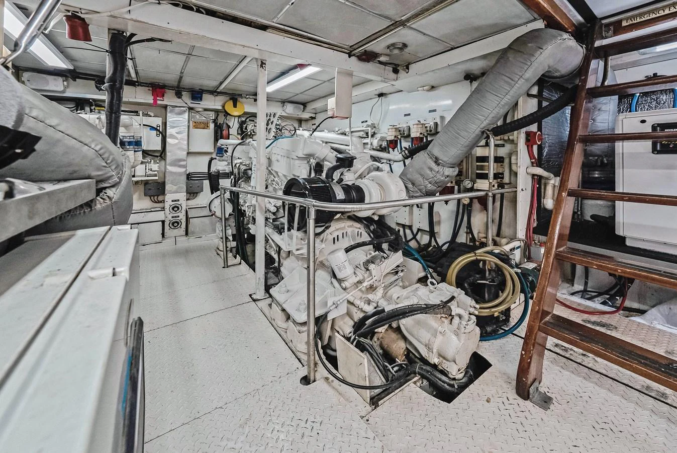 The engine room showcases the yacht's powerful machinery and well-organized systems. aboard SERENITY Yacht for Sale