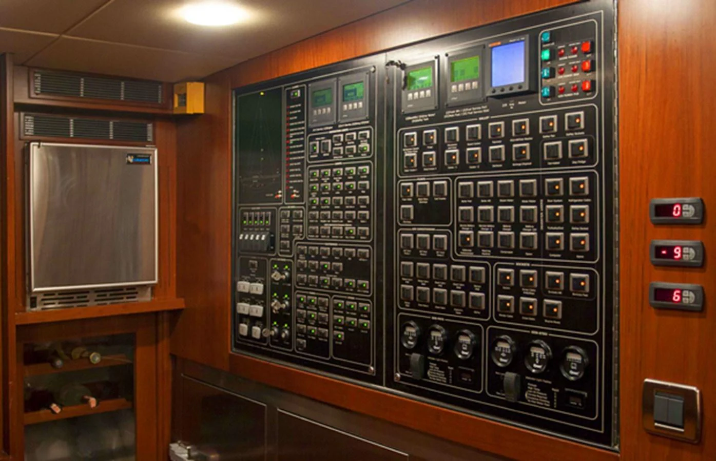 The yacht's control panel showcases advanced technology and meticulous organization. aboard GOLDEN TOUCH Yacht for Sale