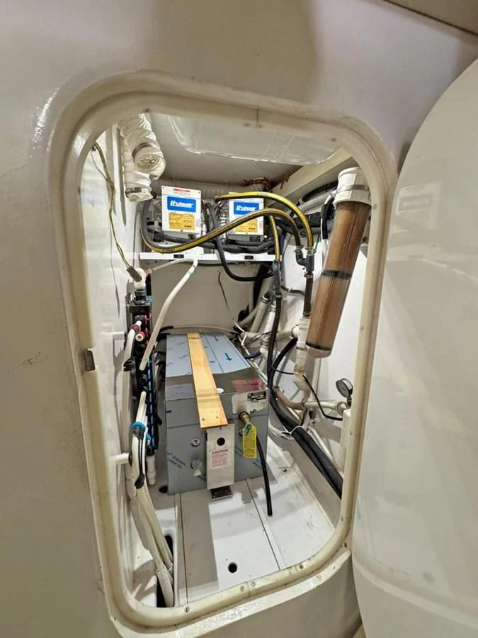 A view into the yacht's technical compartment, showcasing its electrical and mechanical systems. aboard VIKING 68 CONVERTIBLE Yacht for Sale