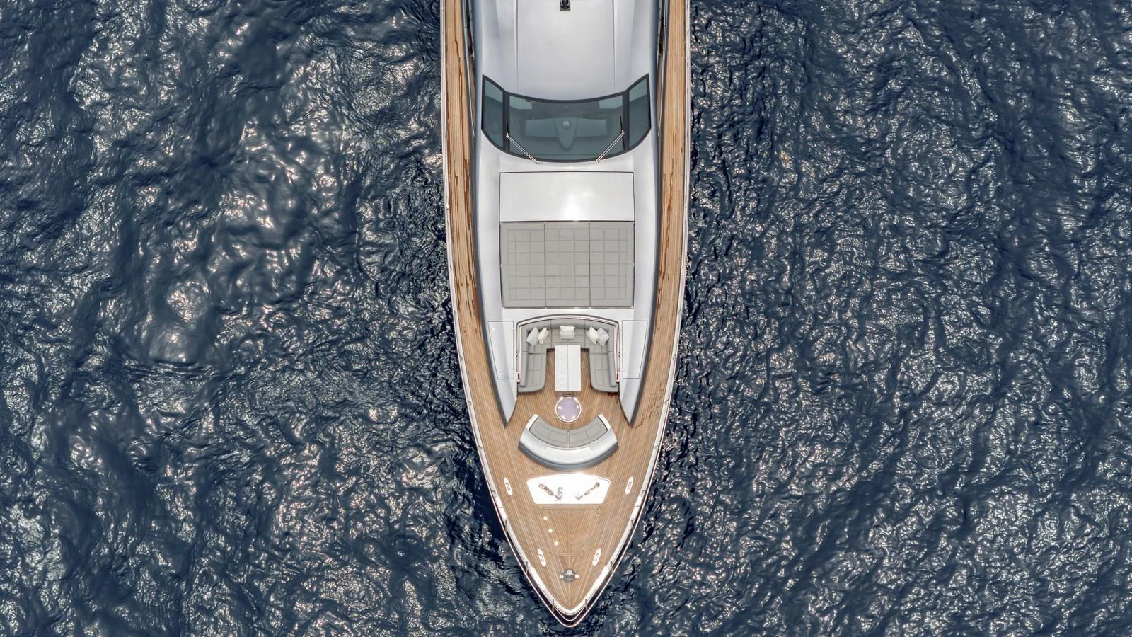 A stunning aerial view of the yacht's bow cutting through the water. aboard ANDIAMO II Yacht for Sale